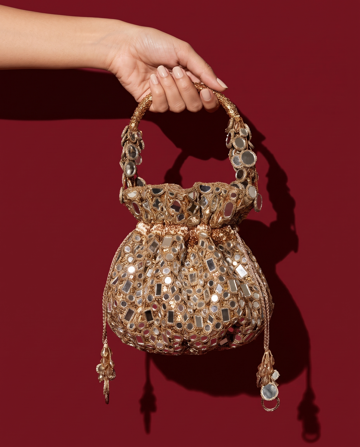Aaina Gol Potli Bag