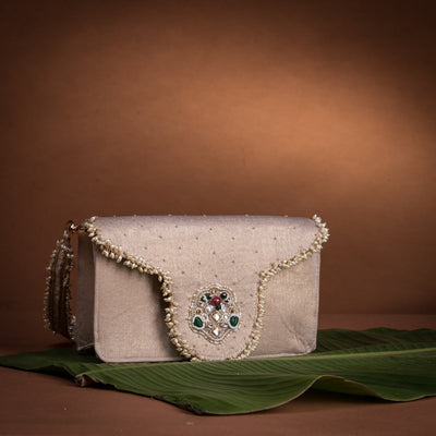 Jadau flap bag – handcrafted Indian embroidery accessory by Ozel
