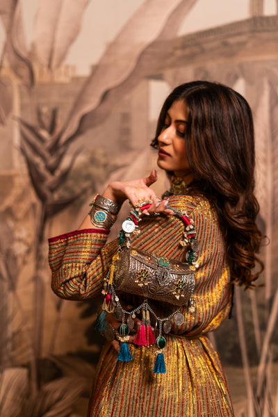 Tara tribal handbag styled with festive ensemble — Ozel
