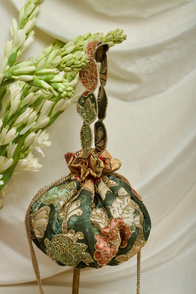 Round gol potli bag with Kalamkari-print silk and hand embroidery — Ozel
