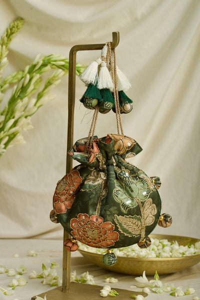 Hand-embroidered Kalamkari print U-shape potli bag with tassels — heritage Indian craft by Ozel