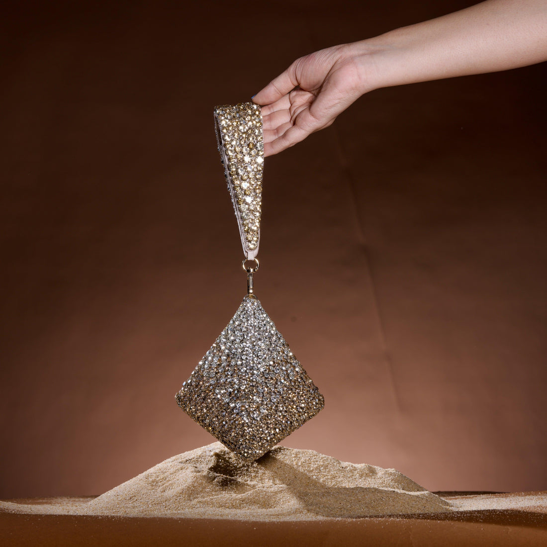 Pyramid structured clutch with embroidered handle styled — Ozel