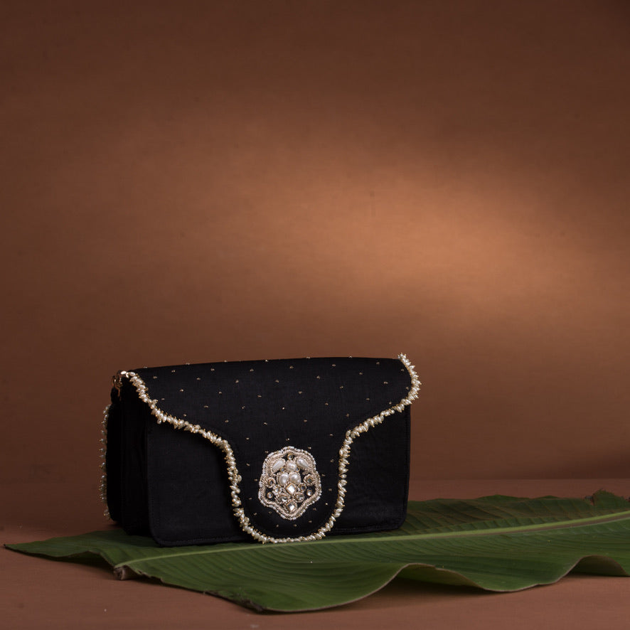 Jadau flap bag – handcrafted Indian embroidery accessory by Ozel