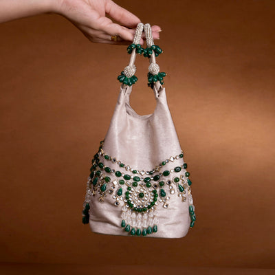 Detail of Panna kundan motifs and emerald accents — Ozel