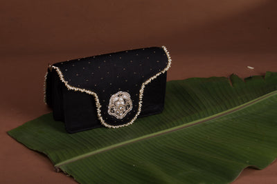Jadau flap bag – handcrafted Indian embroidery accessory by Ozel