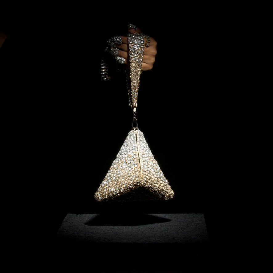 Pranay Jaitly with Gold Silver Pyramid Bag