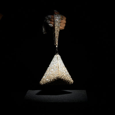 Pranay Jaitly with Gold Silver Pyramid Bag