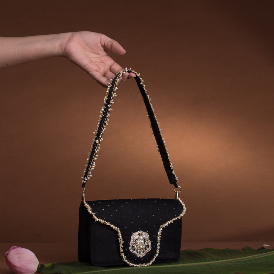 Jadau flap bag – handcrafted Indian embroidery accessory by Ozel