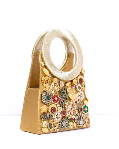 Crown Jewel handheld bag with hand-set embellishments — Ozel