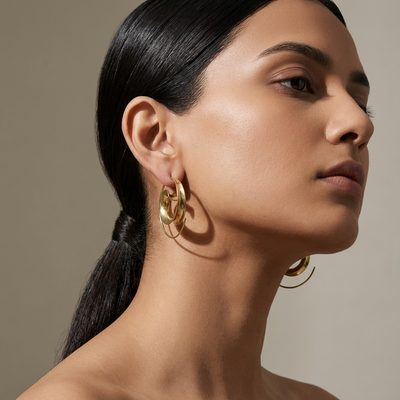 Classic gilded hoop earrings – detail of gold finish by Ozel