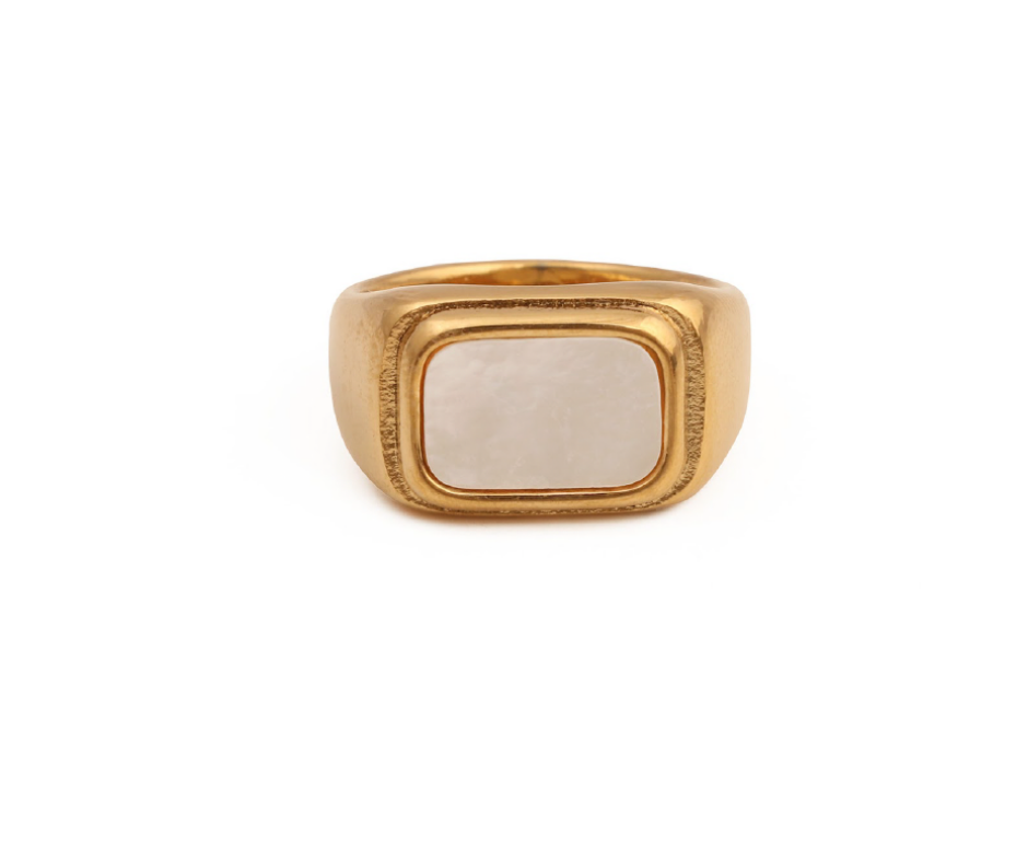 Statement ring with oversized stone centerpiece in gold setting
