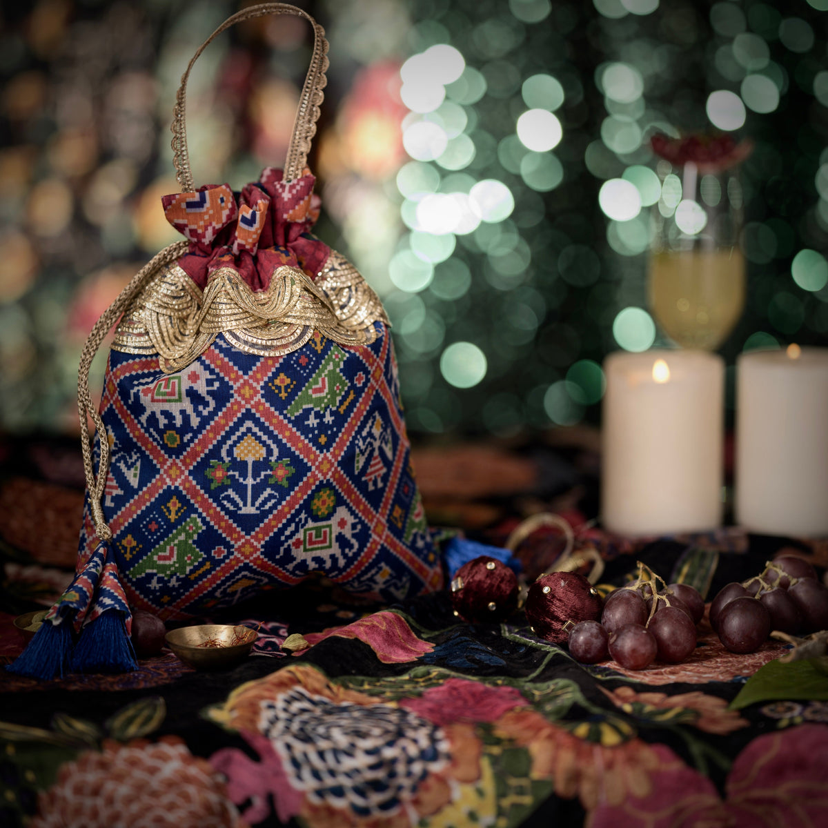 Patola print potli with handmade cone tassel — Ozel