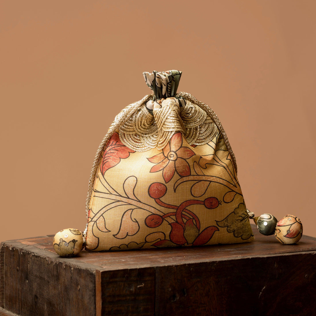 Set of Kalamkari print potli bags grouped — Ozel
