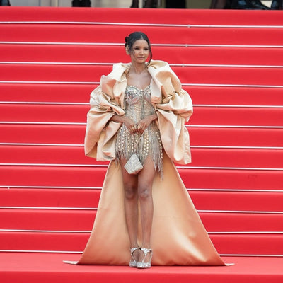Nancy Tyagi with Gold Silver Pyramid Bag