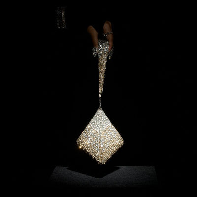 Pyramid structured clutch back view — Ozel
