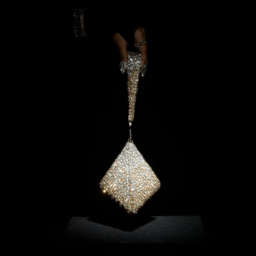 Pranay Jaitly with Gold Silver Pyramid Bag