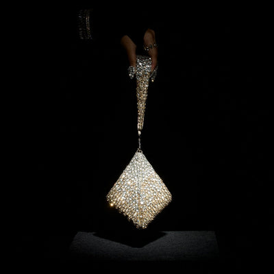 Pranay Jaitly with Gold Silver Pyramid Bag