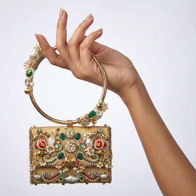Handcrafted gold zardozi mini bag with pearls, kundan stones and emerald cabochons — Ozel