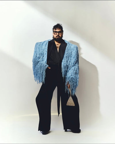 Pranay Jaitly with Gold Silver Pyramid Bag