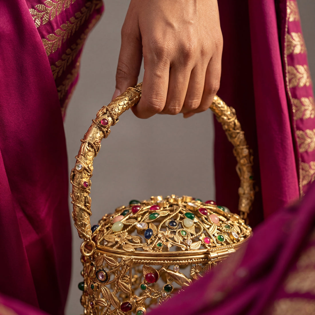 Side view of The Ozel limited edition filigree bucket bag — Ozel
