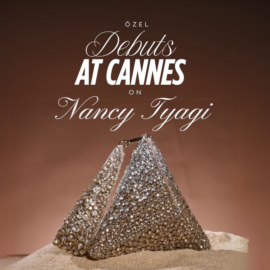 Nancy Tyagi with Gold Silver Pyramid Bag