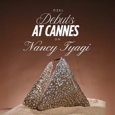 Nancy Tyagi with Gold Silver Pyramid Bag