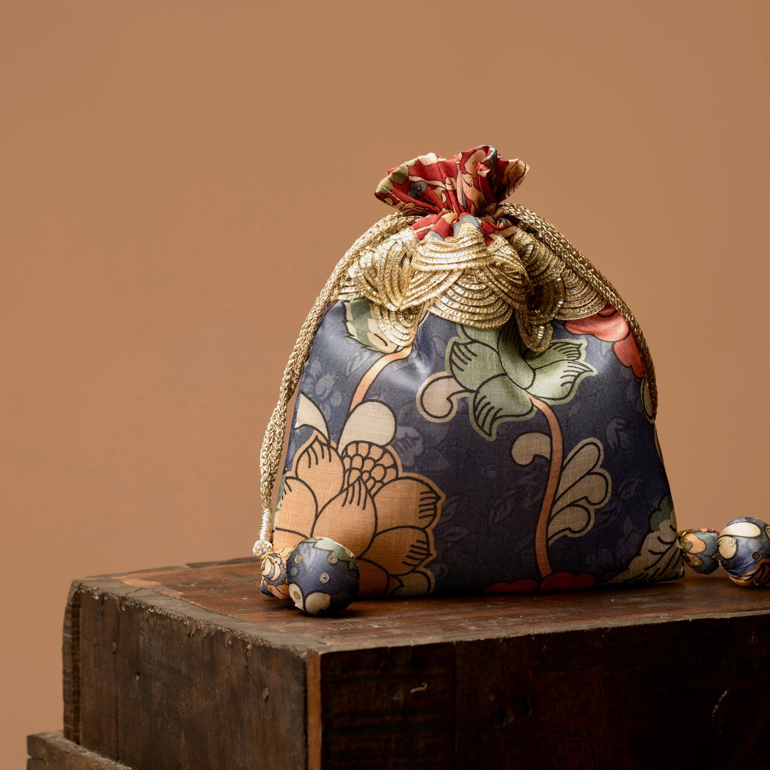 Kalamkari print drawstring potli bag detail — Ozel
