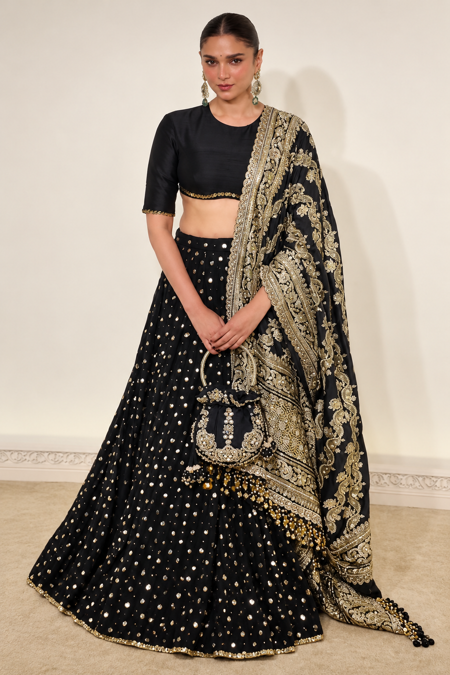 Aditi Rao Hydari carrying the Ozel Jadau Potli Bag in black