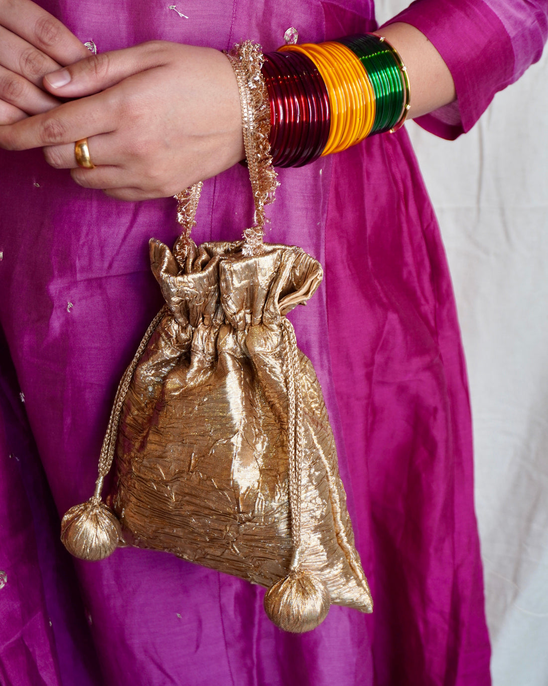 Nisha potli bag tassel detail — Ozel