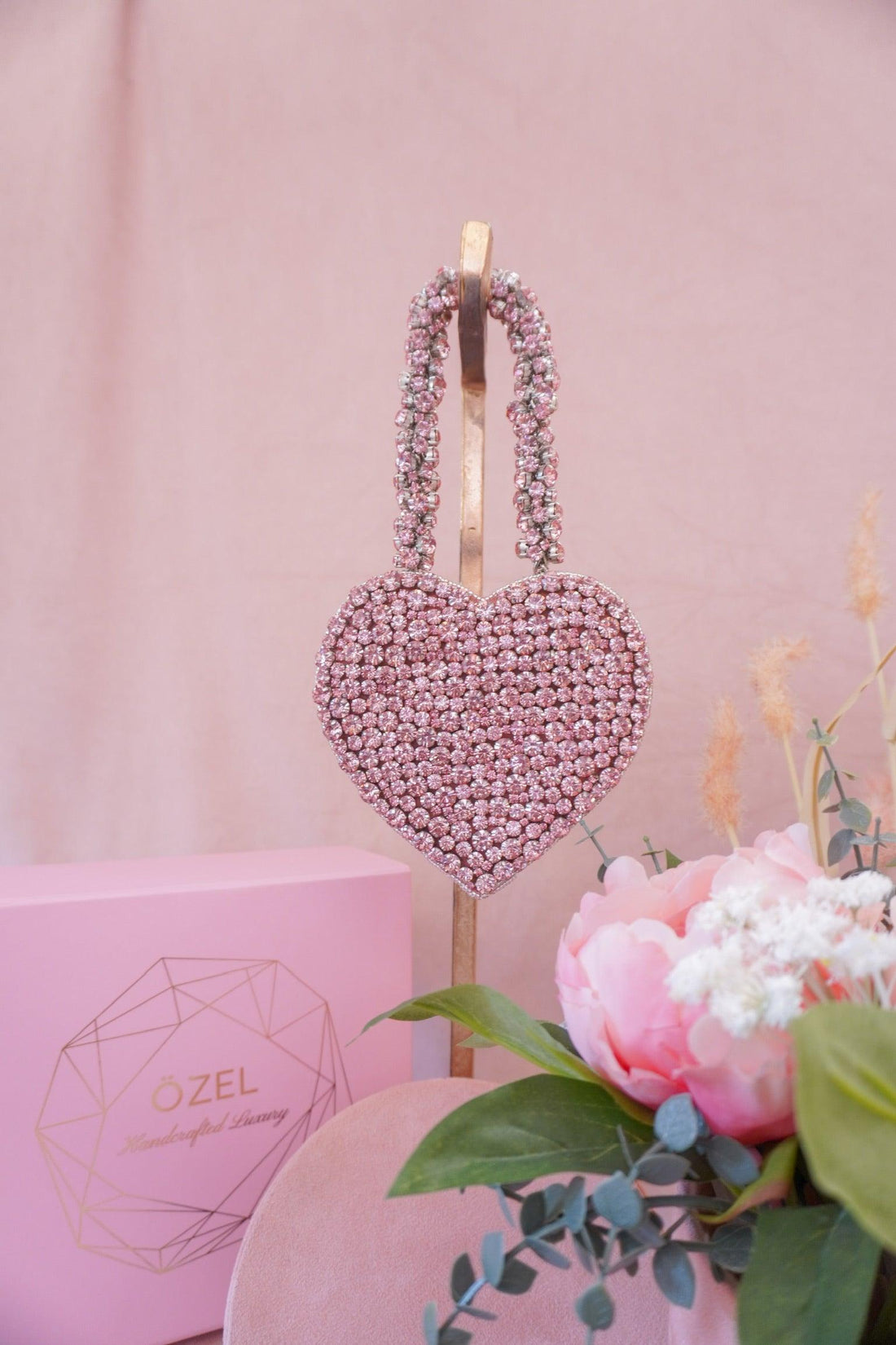 Detail of rhinestone heart bag crystals — Ozel
