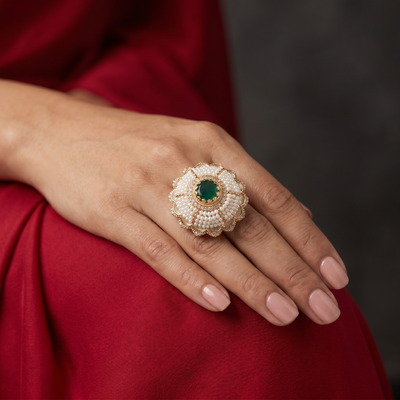 Ravisha antique gold pearl floral ring with emerald centre stone — Ozel