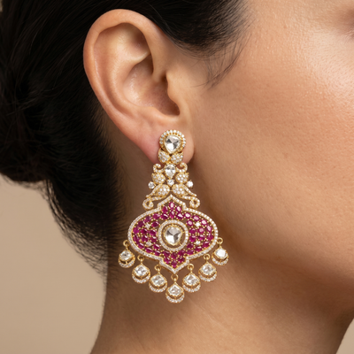 Ridhyika antique gold ruby and kundan statement earrings with dangling charms — Ozel