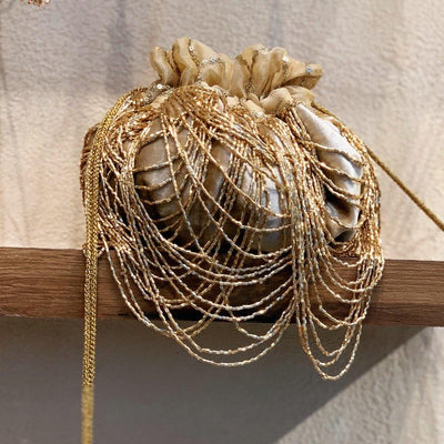 Dragon's Nest embroidered drawstring potli bag with handmade tassels — Ozel