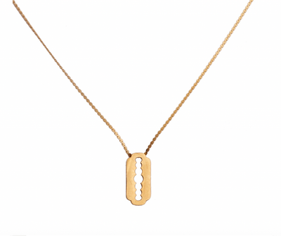 Razor bar pendant necklace – worn on neck by Ozel