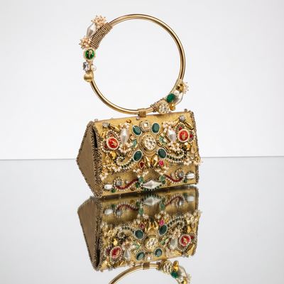 Handcrafted gold zardozi mini bag with pearls, kundan stones and emerald cabochons — Ozel