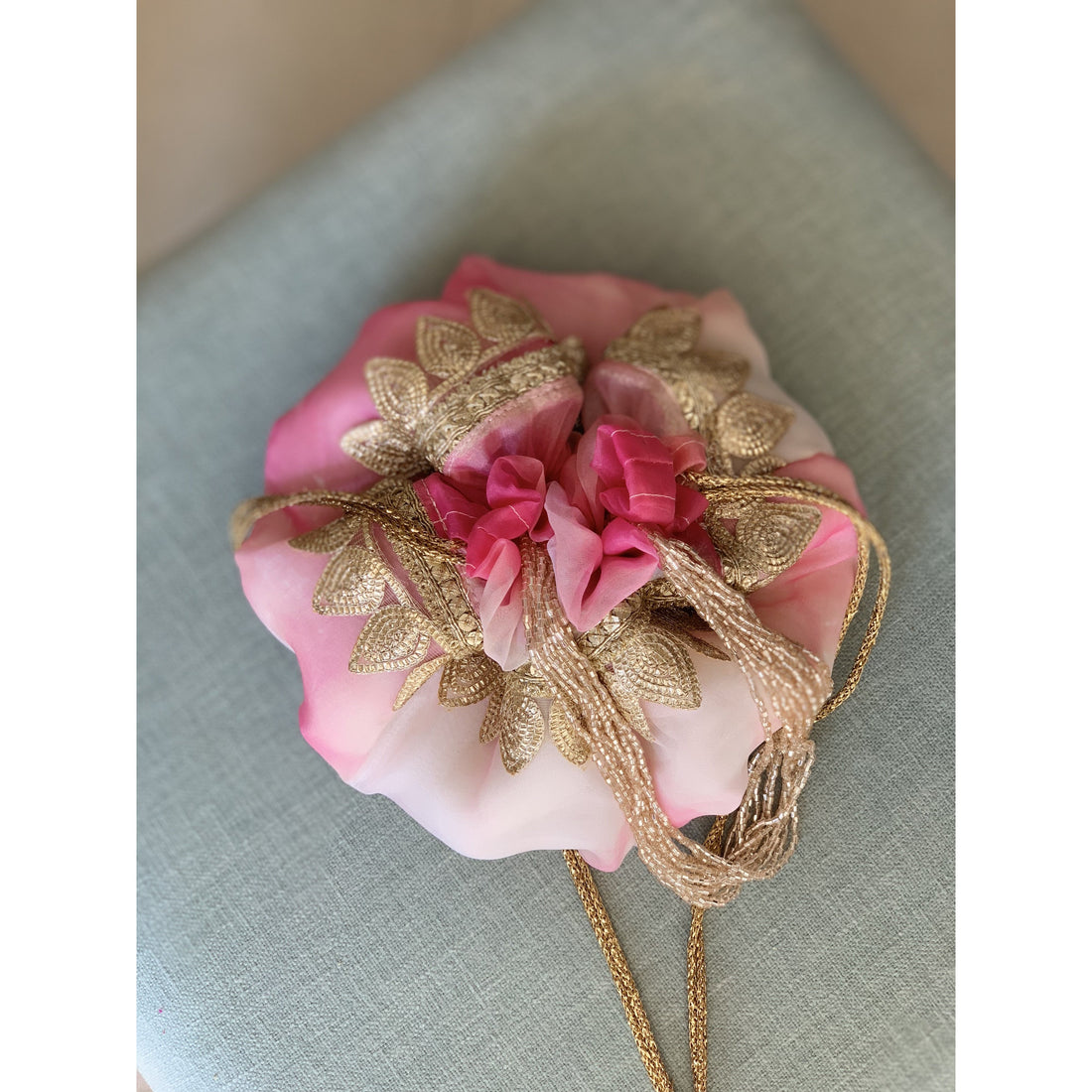 Hand-dyed shibori organza pastel potli bag with cutbits handle — Ozel