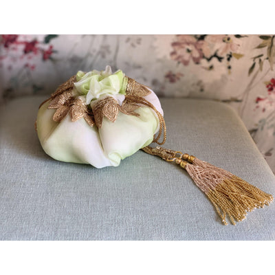 Hand-dyed shibori organza pastel potli bag with cutbits handle — Ozel