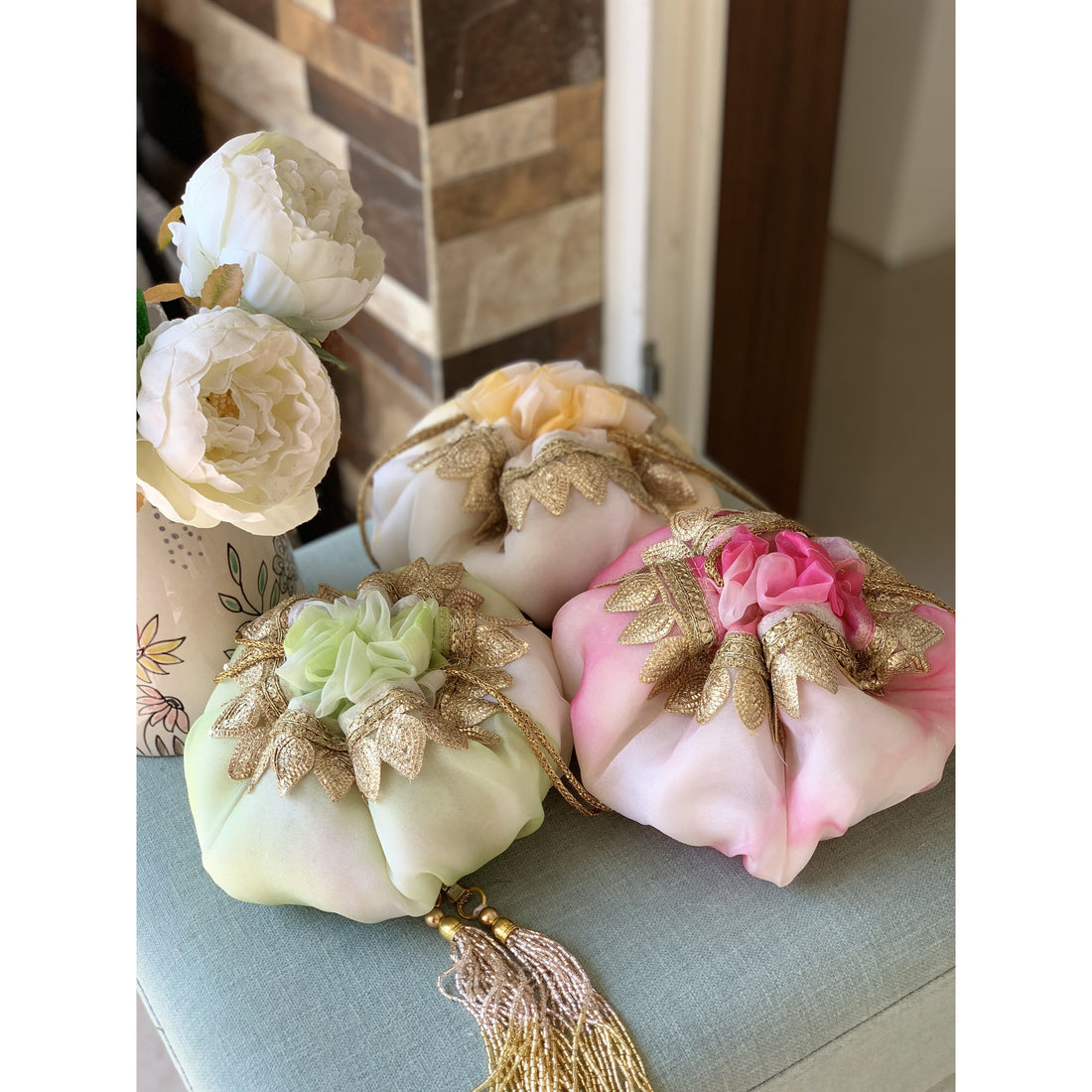 Hand-dyed shibori organza pastel potli bag with cutbits handle — Ozel