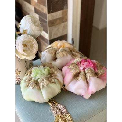Hand-dyed shibori organza pastel potli bag with cutbits handle — Ozel