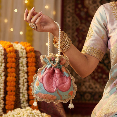 Teal bloom potli bag – handcrafted teal floral potli bag by Ozel