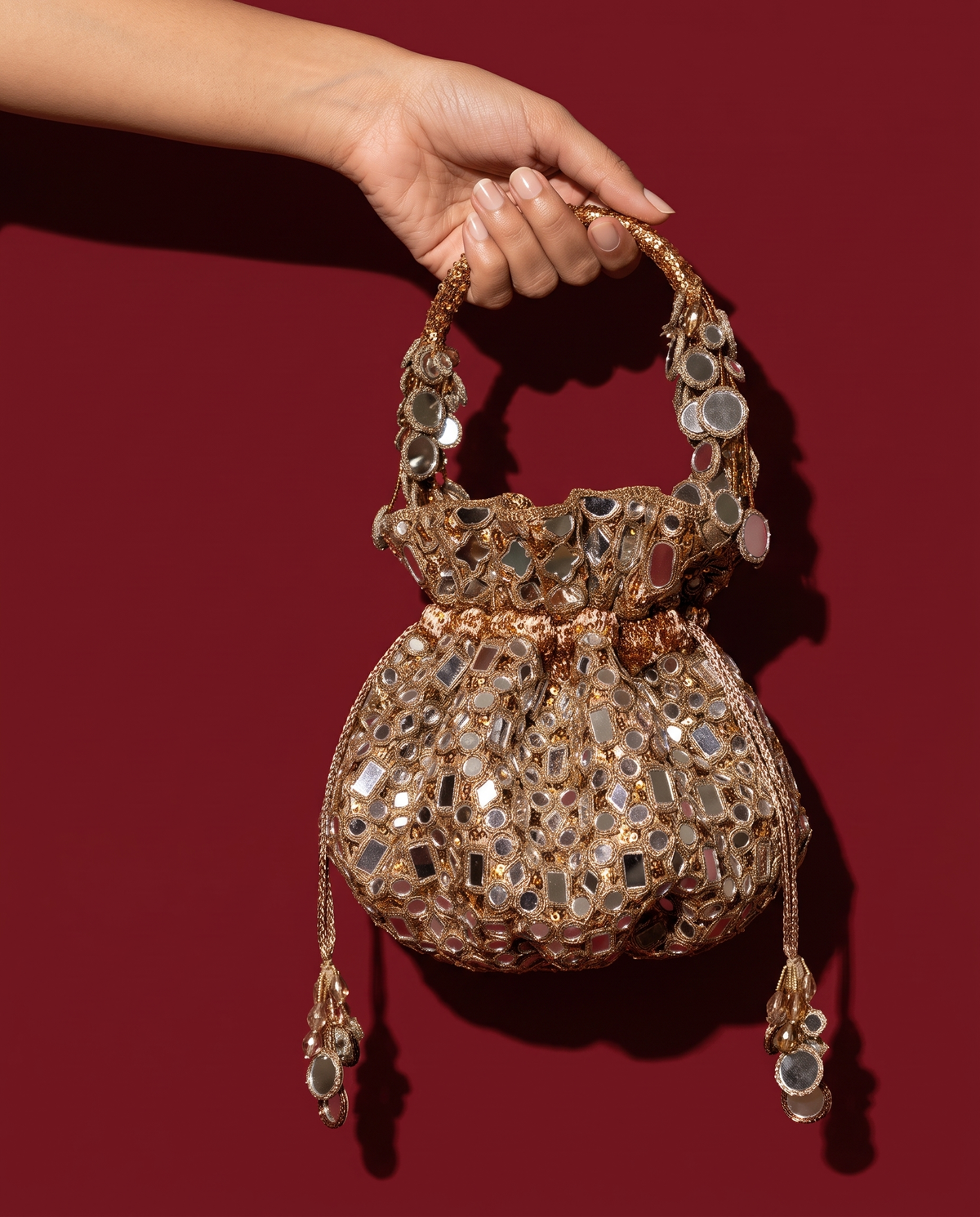 Aaina Gol Potli Bag