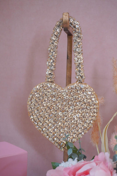 Rhinestone heart bag styled with evening look — Ozel