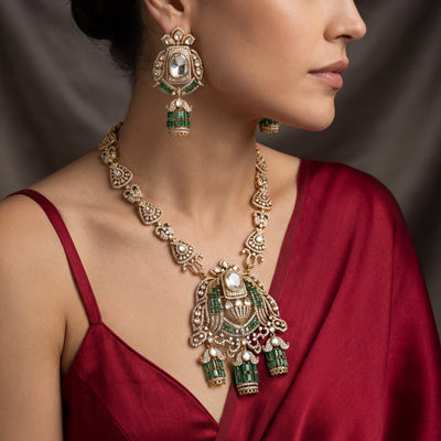 Rajvansh Emerald Polki Statement Set with uncut diamonds and vivid emerald stones by Ozel